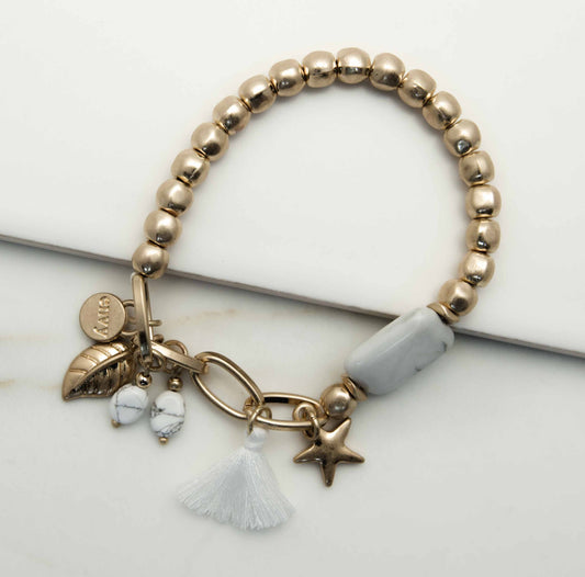 Envy stretch bracelet with marble stone, tassel and charms 1745