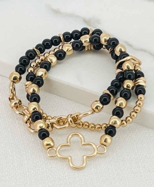 Envy stretch bracelet black and gold clover 3049